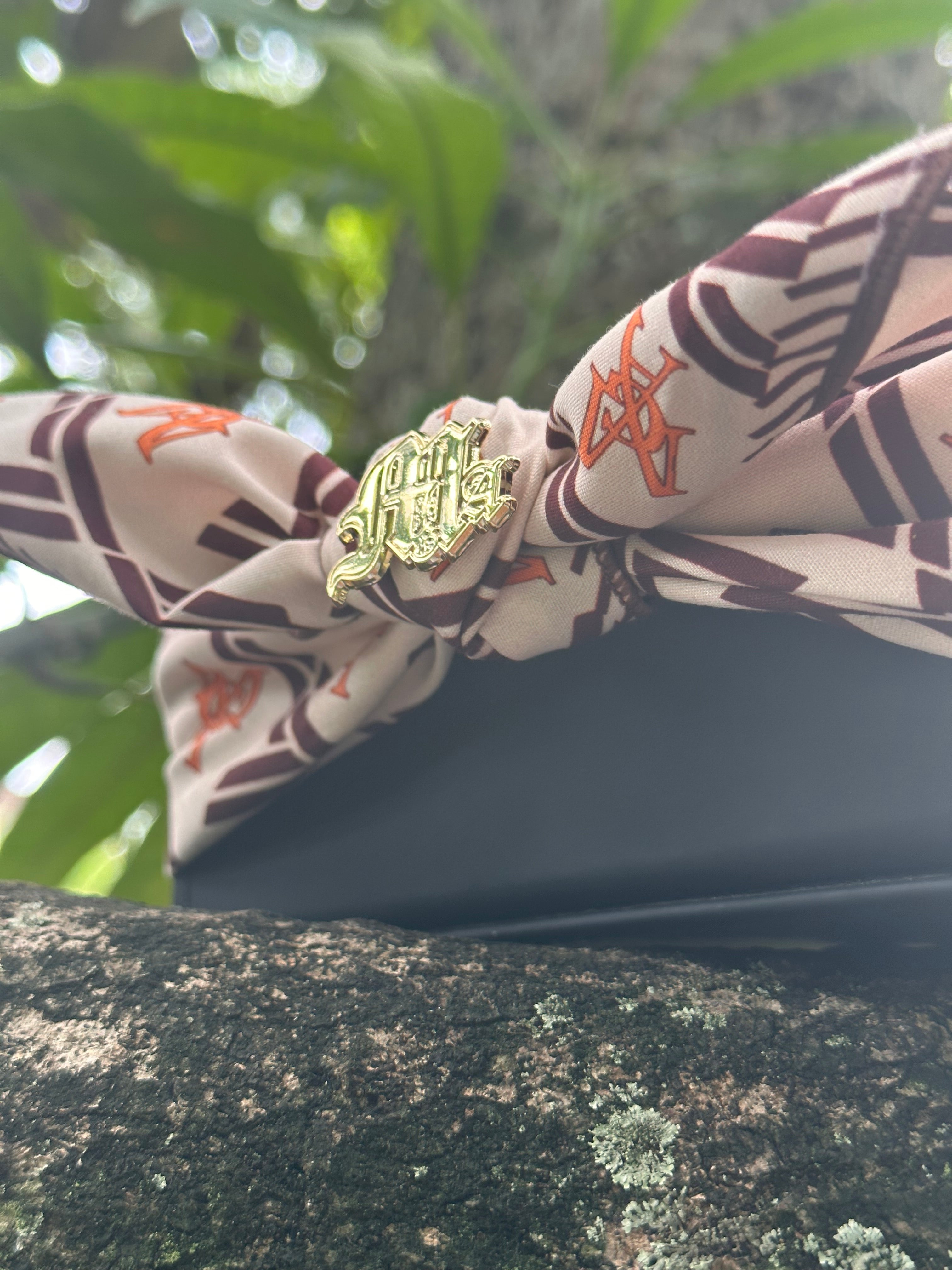 MGA GOLD PIN