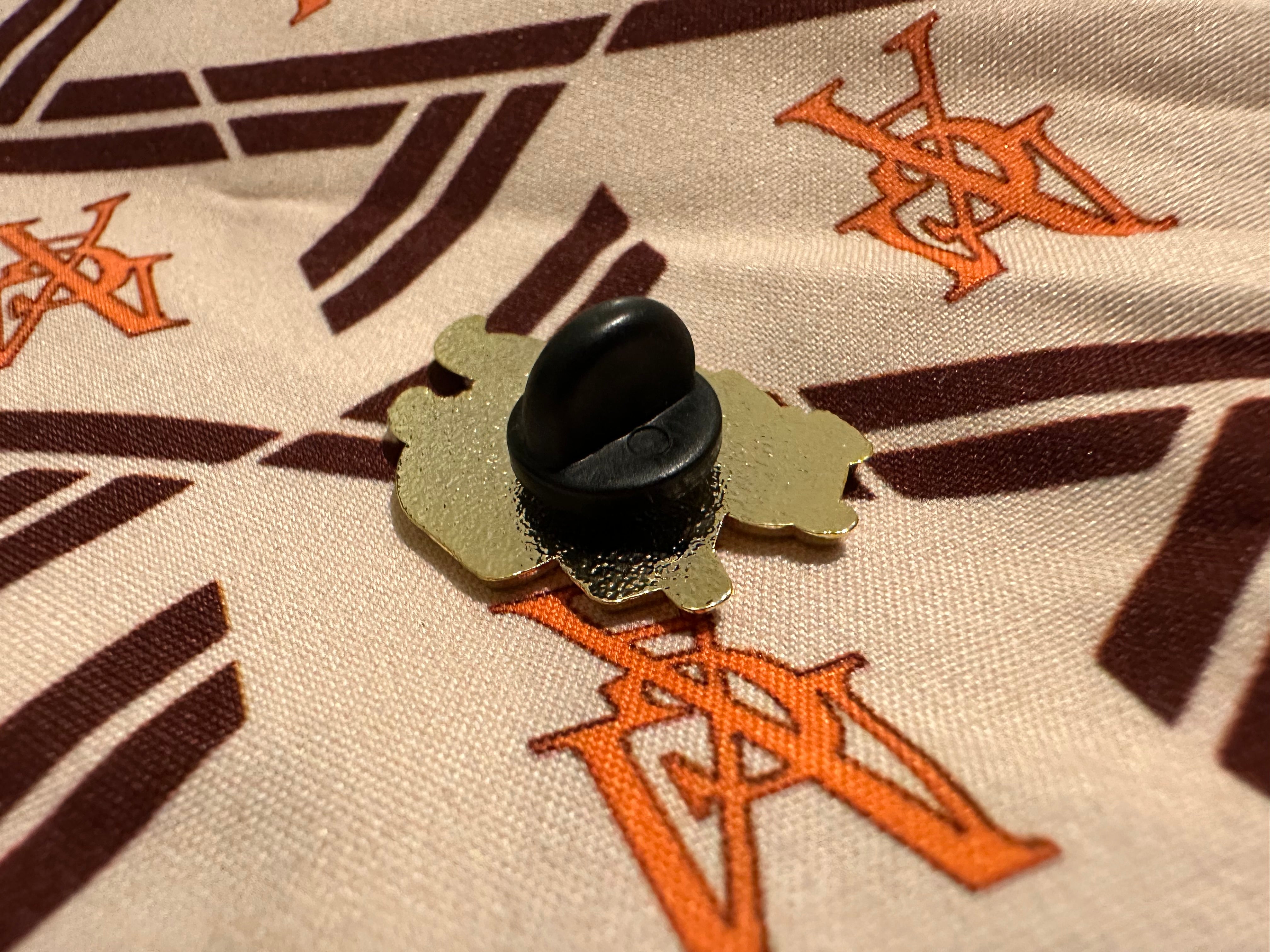 MGA GOLD PIN